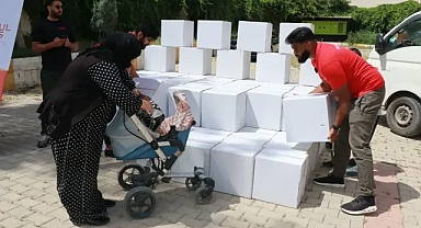 Akçakale’de 120 yetim ve dul aileye gıda yardımı